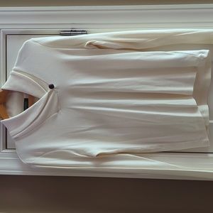 Cream, long sleeve knit shirt with collar button